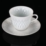 FREIDL HOLZE-KJELLBERG for Arabia, Finland, a white rice porcelain cup and saucer, makers stamps