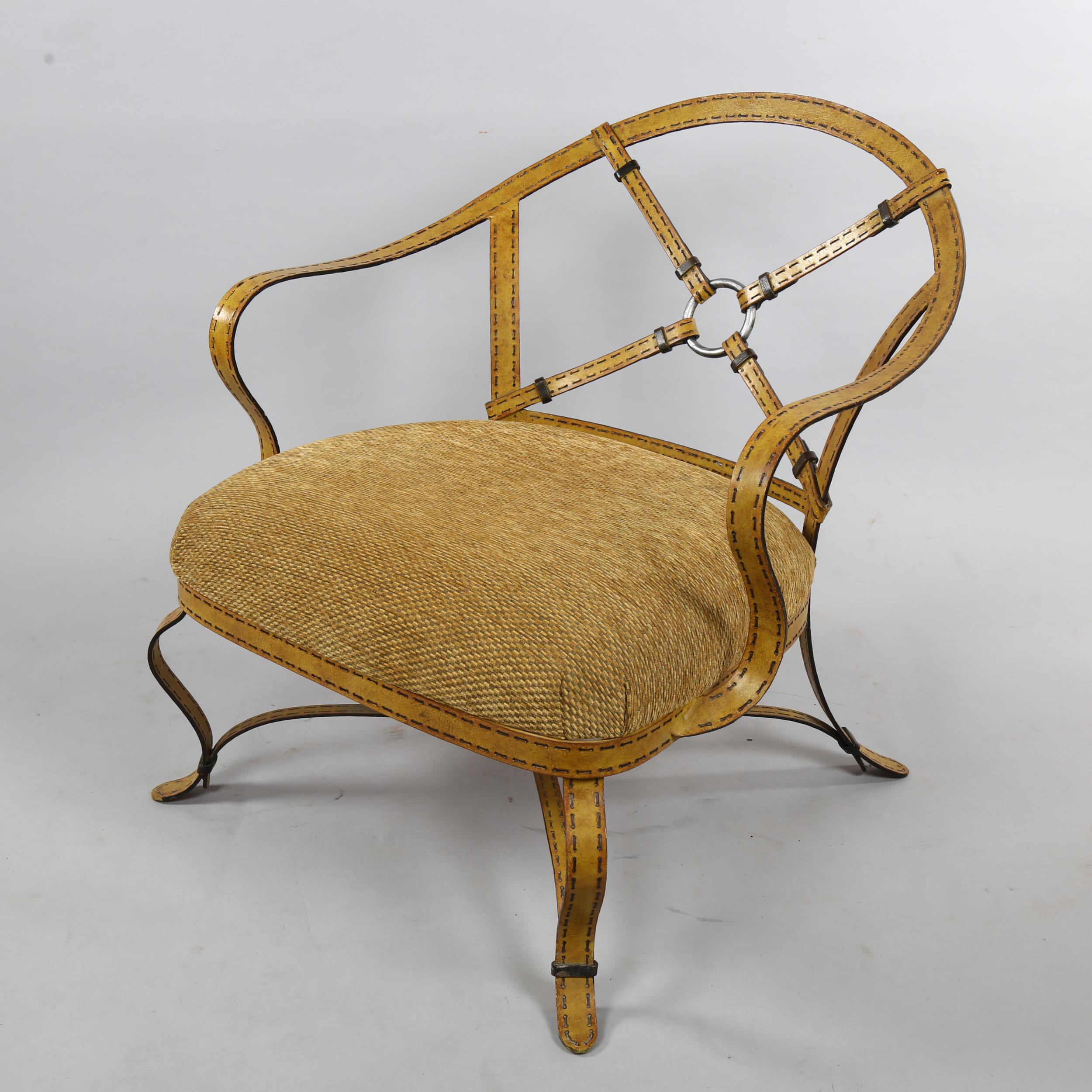 A trompe l’oeil wrought iron lounge chair in the manner of Adnet or Hermes, the iron work frame