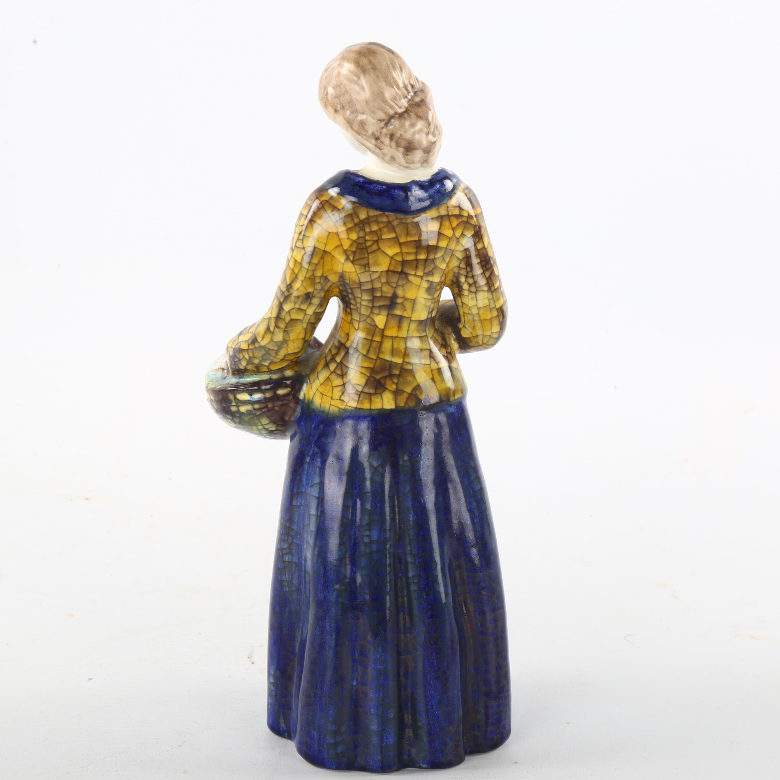 MARIANNE STARCK for Michael Andersen, a Danish pottery figurine of a woman holding a basket of - Image 2 of 4