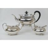 George V silver three piece tea service, maker H A, Sheffield 1923/25 and 1930, plain bombe form,