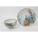 Hermes Carnet d'Equateur porcelain cup and saucer, decorated with various equatorial animals,