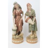 Pair of Royal Dux figures, depicting Italianate water carriers, model no. 1050/1, decorated