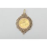 Half sovereign pendant, centred with an Elizabeth II coin of 1982, within a 9ct gold lappet pendant,