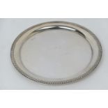 George V silver salver, Sheffield 1917, circular form with gadrooned edge, 30cm diameter, weight