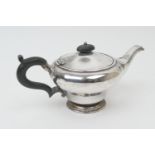 George V bachelor's silver teapot, Birmingham 1917, of inverted baluster form, hinged cover with