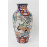 Japanese Imari vase, Taisho (1912-26), ovoid form decorated with cranes and wisteria in underglaze