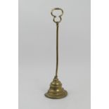Victorian brass door porter, height 50.5cm