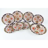 Crown Derby Porcelain imari plates and bowl, circa 1878-1902, comprising bowl, 26.5cm diameter; pair