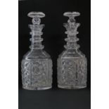 Pair of Victorian cut glass triple ring neck mallet decanters, with stoppers, 28cm