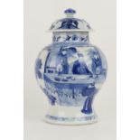 Chinese blue and white jar and cover, 19th Century, painted in Kangxi style with figures at a table,