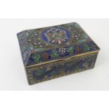 Austrian champleve enamel casket, early 20th Century, the hinged cover worked with a central roundel