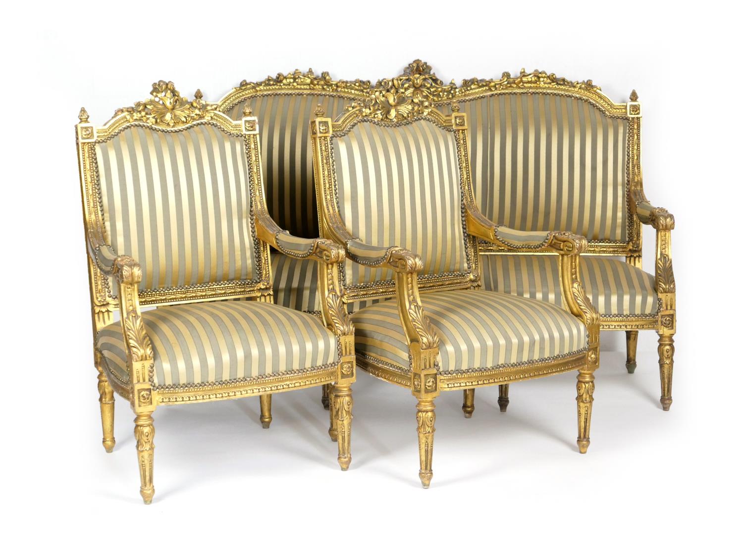 French giltwood salon suite, in Baroque style, comprising canape with a moulded foliate cresting