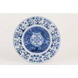 Chinese blue and white export plate, Kangxi (1662-1722), richly decorated with flowers and