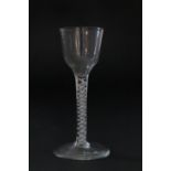 Early George III wine glass, circa 1770, ogee bowl, slightly moulded over an opaque outlined lace