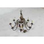 Dutch style copper finish eight branch chandelier, surmounted with a double headed eagle, 77cm