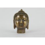 Tibetan filled bronze head of Buddha, with Chinese character seal to the base, height 15cm