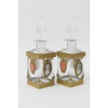 Pair of French ormolu mounted cut glass scent bottles, circa 1900-10, square section with tear