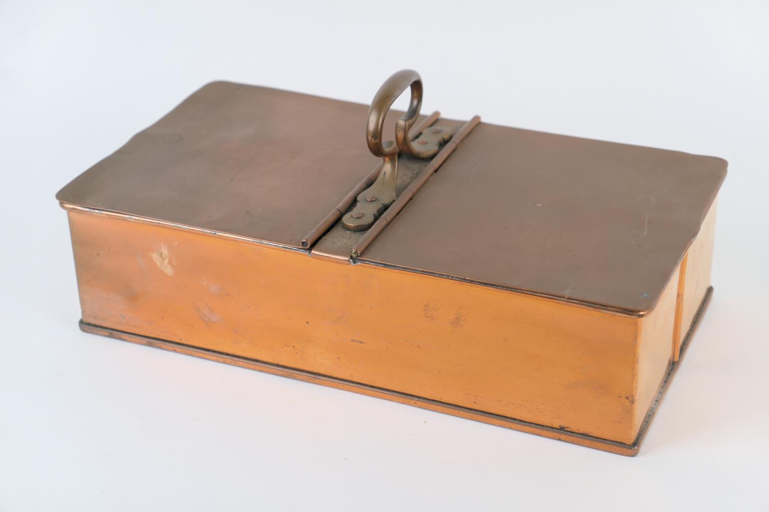 Victorian copper cool box, by Jones Bros., circa 1870, with central handle and two hinged covers,