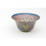 Oriental plique-a-jour bowl, flared form, worked with orchids in colours against pink fish scale
