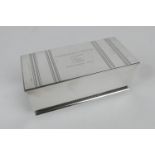George VI silver presentation cigarette box, by Goldsmiths & Silversmiths Company, London 1947,