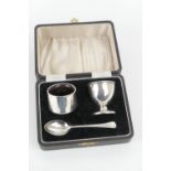 George V silver christening set, Birmingham 1939, comprising eggcup, napkin ring and spoon, cased