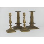 Pair of George III brass bi-sectional candlesticks, height 20cm; also a pair of Victorian cast brass