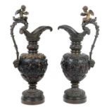 Pair of Renaissance Revival bronze Cellini ewers, late 19th Century, mid brown patina, height 57cm