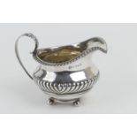 George III silver sauceboat, by George Burrows I, London 1781, acanthus capped handle, gadrooned
