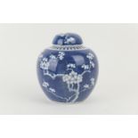 Chinese blue and white prunus pattern ginger jar and cover, late 19th Century, the base marked