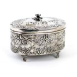 Judaica interest: Sterling silver etrog box, oval form with hinged cover and flower finial,