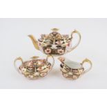 Royal Crown Derby imari tea service, circa 1890-1915, comprising teapot, lidded sucrier and milk