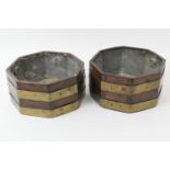 Pair of mahogany and brass bound octagonal wine coolers, each with metal liner, 25.5cm, height 14cm