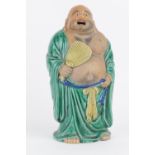 Chinese glazed terracotta figure of a bearded man holding a fan, 20th Century, height 25cm