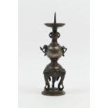 Japanese bronze pricket candle stand, Meiji (1868 - 1912), baluster form, with lotus flower