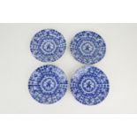 Four Japanese blue and white printware plates, painted character marks, 18.5cm