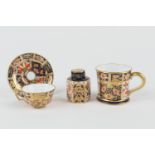 Royal Crown Derby miniature tea cup and saucer, circa 1912, pattern 2451, printed marks, height 3cm;