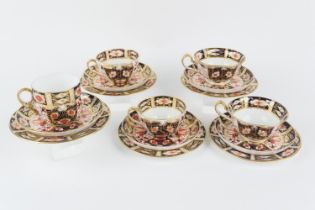 Five Royal Crown Derby imari composite trios, all pattern 2451, various dates circa 1910-25