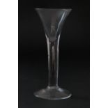 George II wine glass, circa 1740, drawn trumpet bowl with a tiered stem and conical foot, height