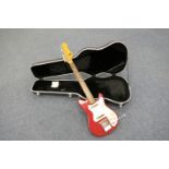 Vintage Antoria electric guitar, probably late 1950s, with red body and silver coloured scratch