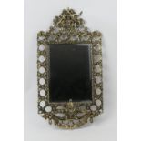 French cast brass mirror, rectangular bevelled glass plate surmounted with cherubs and a guilloche