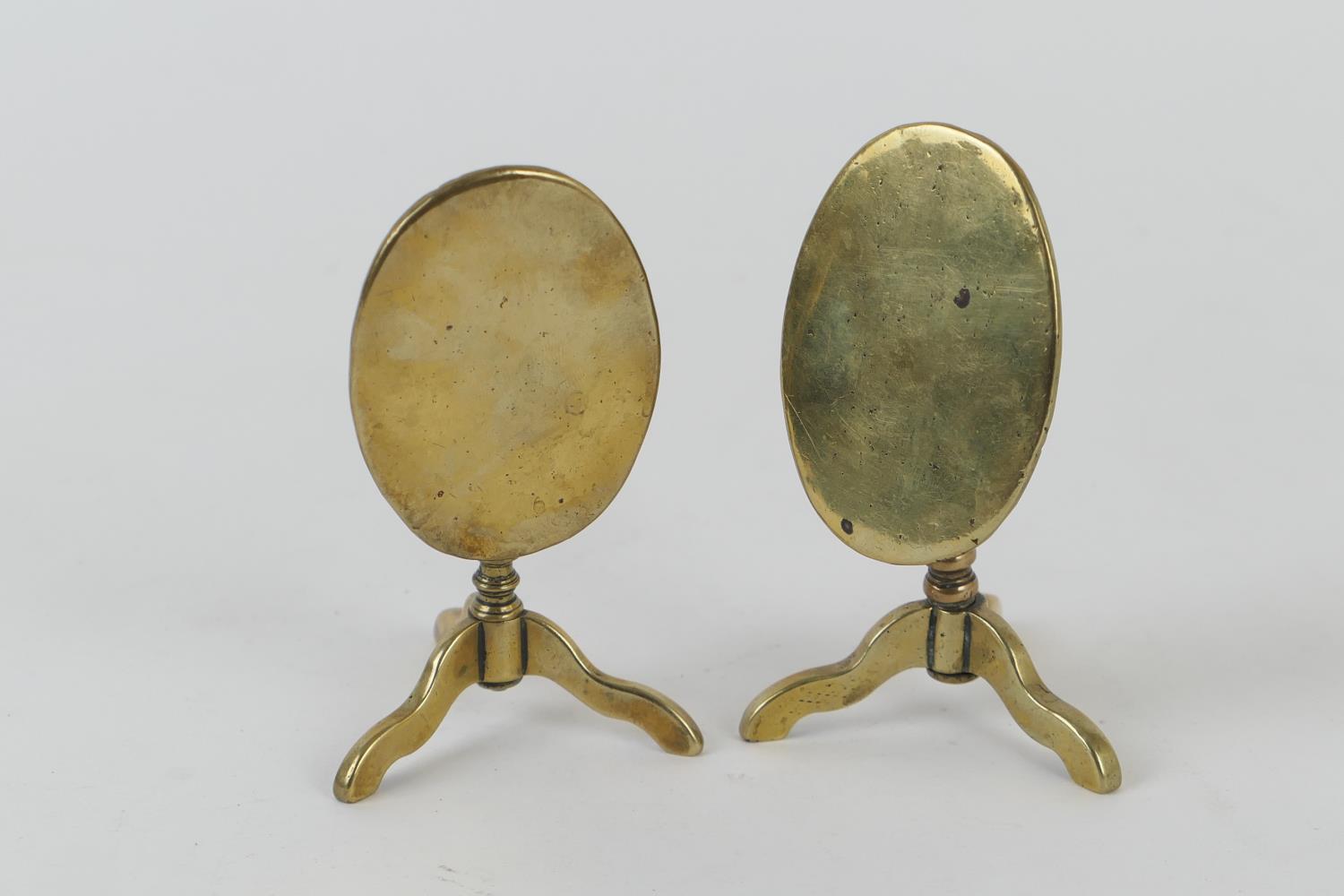 Pair of Victorian brass miniature tilt top tripod tables, height 10.5cm