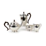 George V silver four piece tea service, by Adie Bros., Birmingham 1928/29, comprising teapot, hot