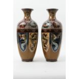 Pair of Japanese cloisonne vases, late Meiji (1868 - 1912), faceted ovoid form with trumpet neck,