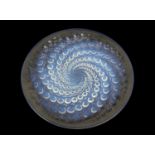 Lalique Volutes plate, reverse moulded with a swirl of graduating bubbles, tinted with blue