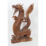 Well carved wooden dragon sculpture, late 20th Century, height 80cm