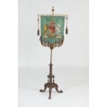 Victorian carved walnut and brass beadwork banner pole screen, the fabric banner worked with the