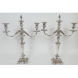 Pair of Victorian silver plated candelabra, having three sconces each with removable nozzle,