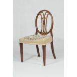 George III mahogany and upholstered side chair, in the Hepplewhite style, oval splat back and