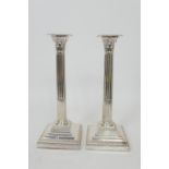 Pair of George V silver Corinthian column candlesticks, by Hawksworth Eyre Ltd, Sheffield 1912,