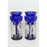 Pair of Victorian blue glass lustres, lappet crenellated top decorated with white forget-me-nots and